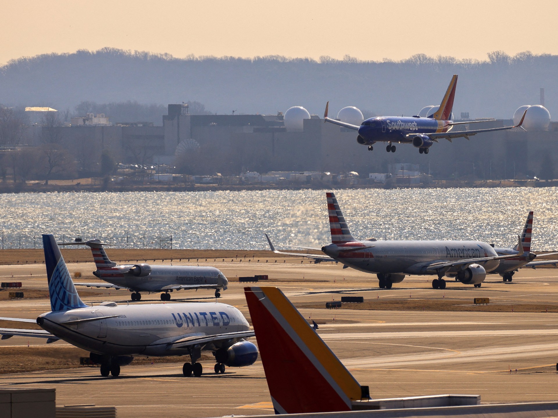 American Airlines planes bump wings at Washington airport