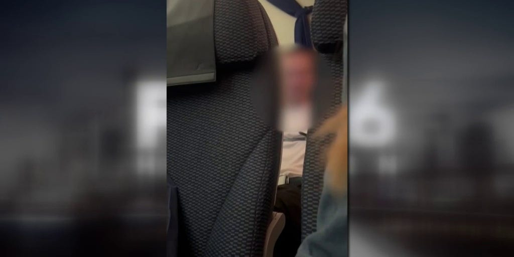 Passenger experiencing medical crisis attempts to open plane door mid-flight to Houston