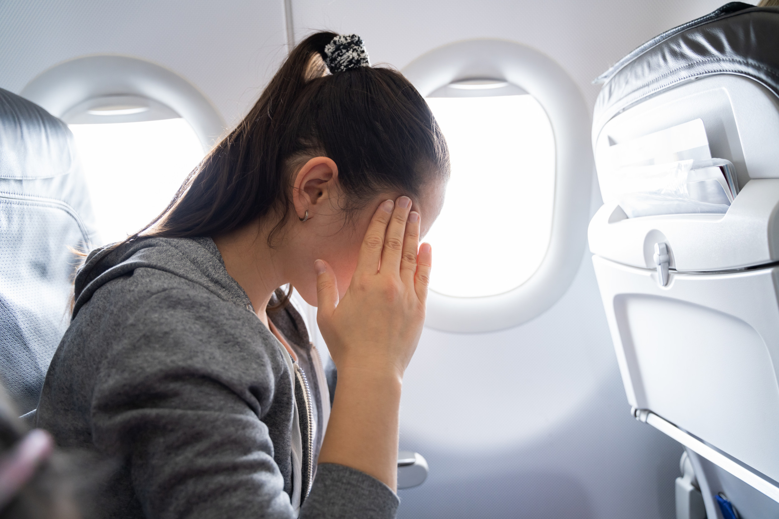 Fury as teen left on verge of tears by fellow plane passenger: “so upset”